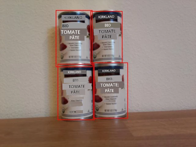 4 boîtes de concentré de tomate avec des boîtes englobantes autour de chaque boîte
