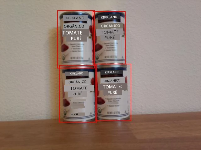 4 latas de extrato de tomate com caixas delimitadoras ao redor de cada lata