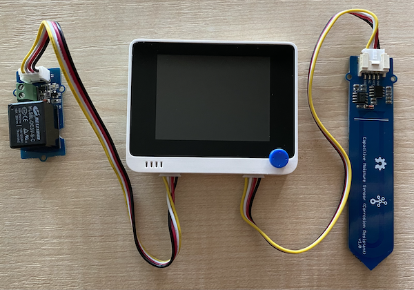 The grove relay connected to the left-hand socket, and the soil moisture sensor connected to the right hand socket