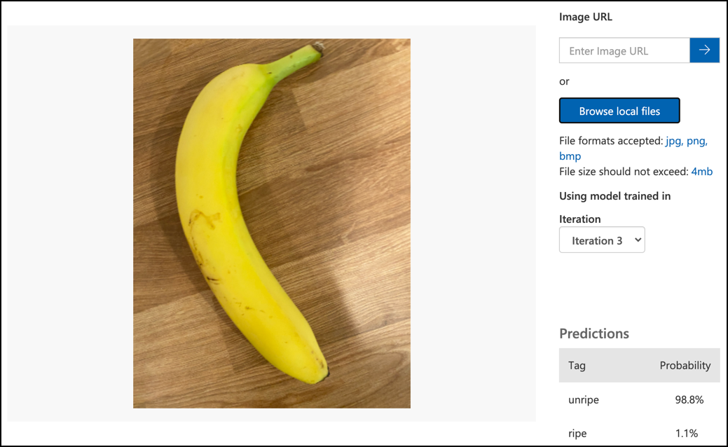 A unripe banana predicted as unripe with a 98.9% probability, ripe with a 1.1% probability